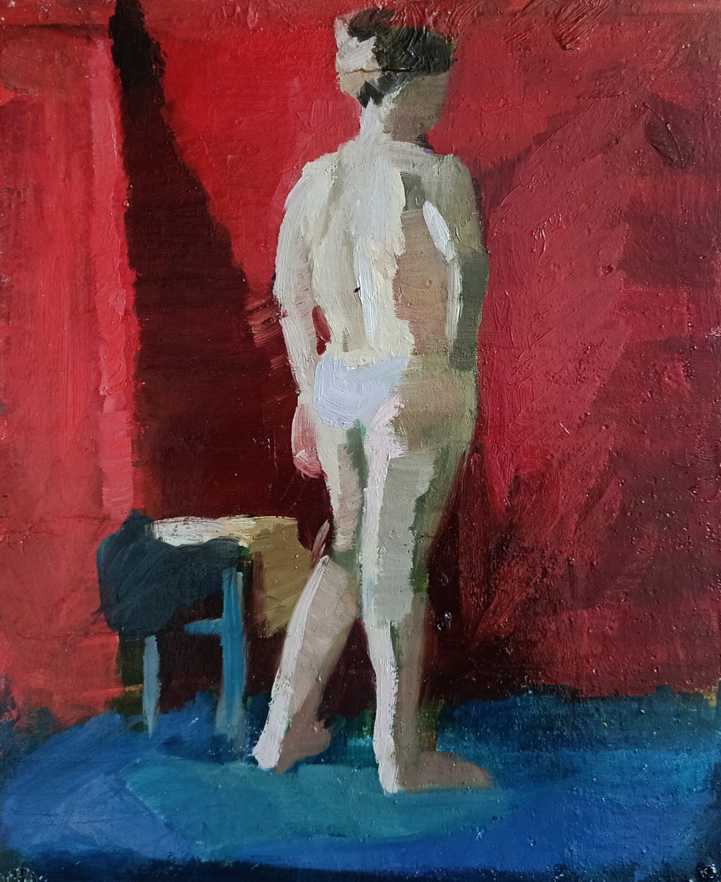 A female figure on a bright red background